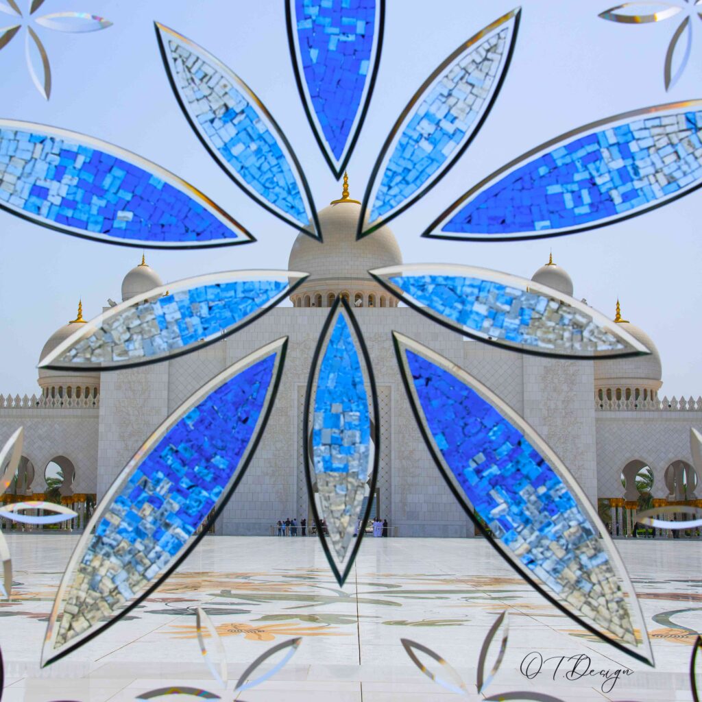 The Sheikh Zayed Grand Mosque seen through a painted glass in Abu Dhabi, UAE