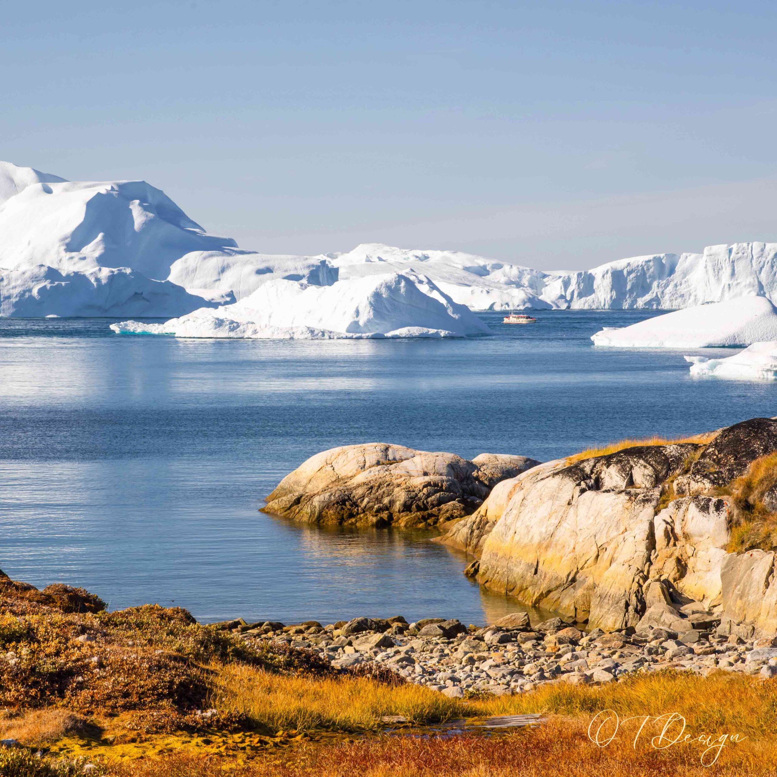 The colorful houses against the icy landscape in Ilulissat, Greenland