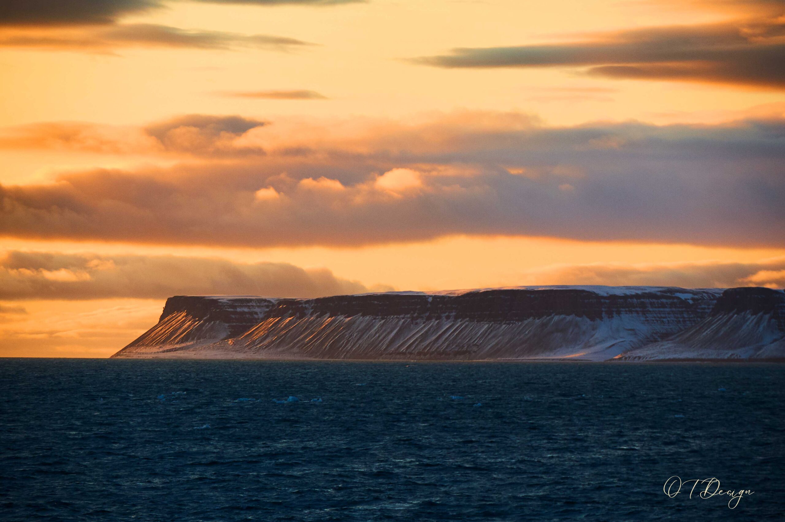 A Cliff's Majestic Silhouette in the Northwest Passage Sunset