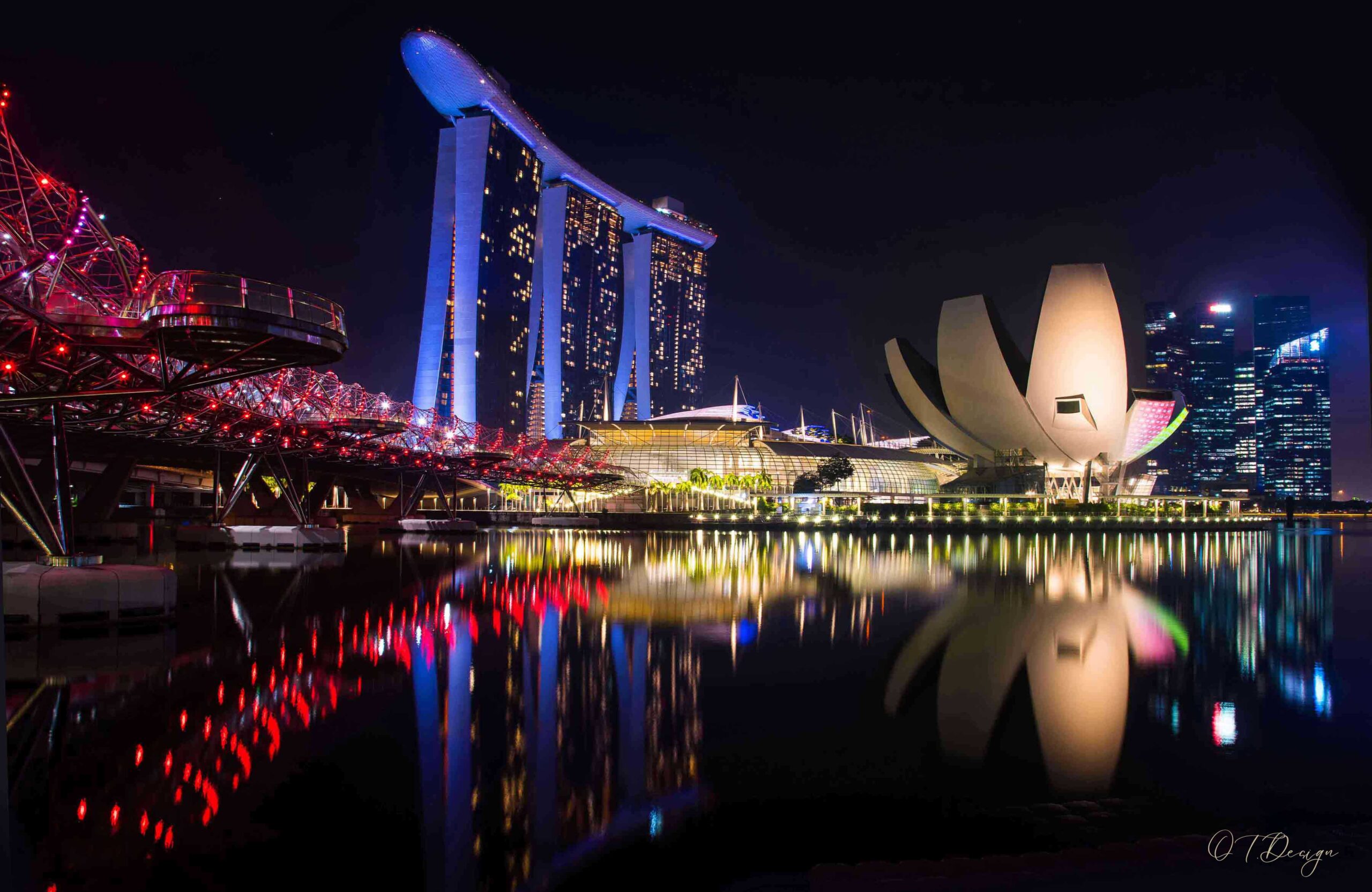 A symphony of nighttime radiance in Singapore - lights reflections of the  Marina Bay in Singapore