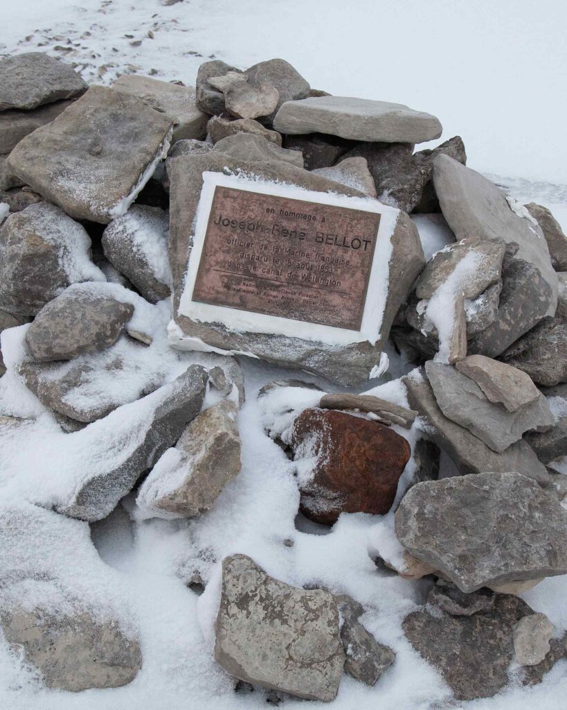 Commemorative stone engraved with the name of Joseph René Bellot, a courageous Arctic explorer who left an indelible mark on the icy landscapes of the Northwest Passage.